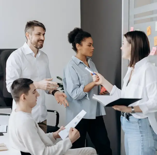Team discussing guest posting campaign workflow